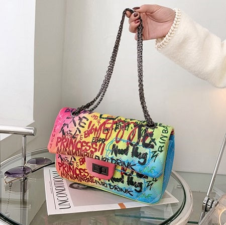 colorful graffiti bag with a chain strap