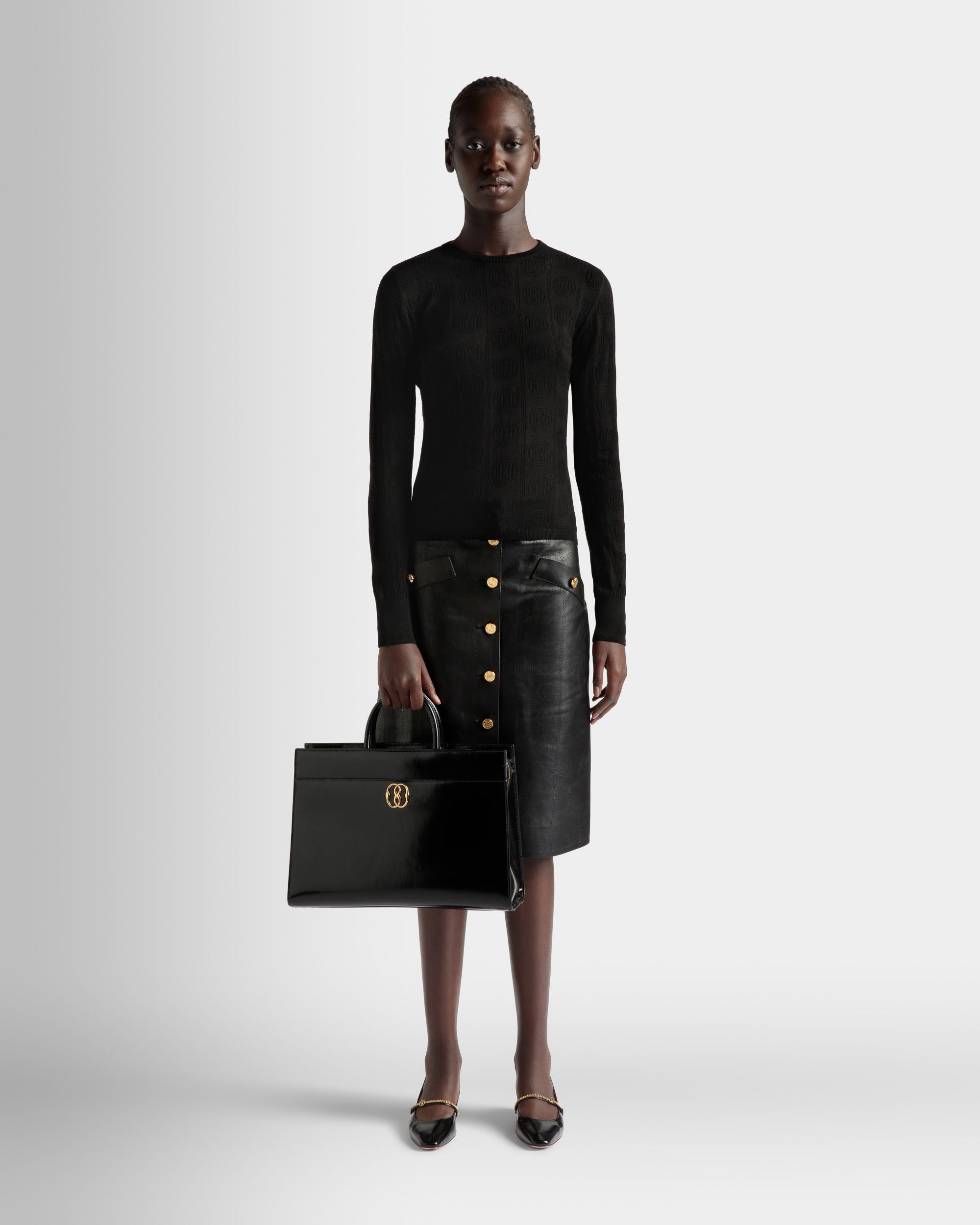 Emblem | Women's Tote Bag in Black Brushed Leather | Bally | On Model Front