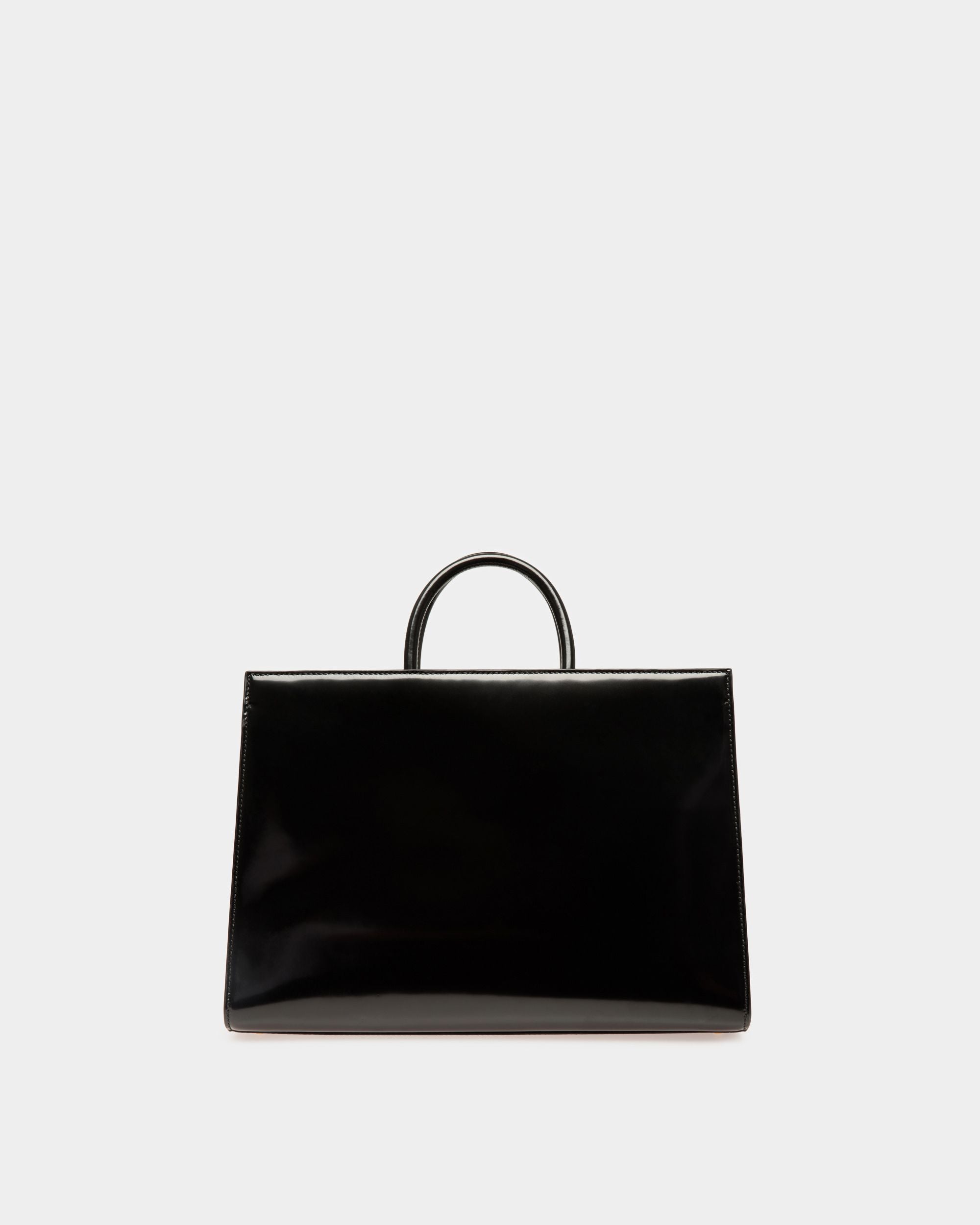 Emblem | Women's Tote Bag in Black Brushed Leather | Bally | Still Life Back