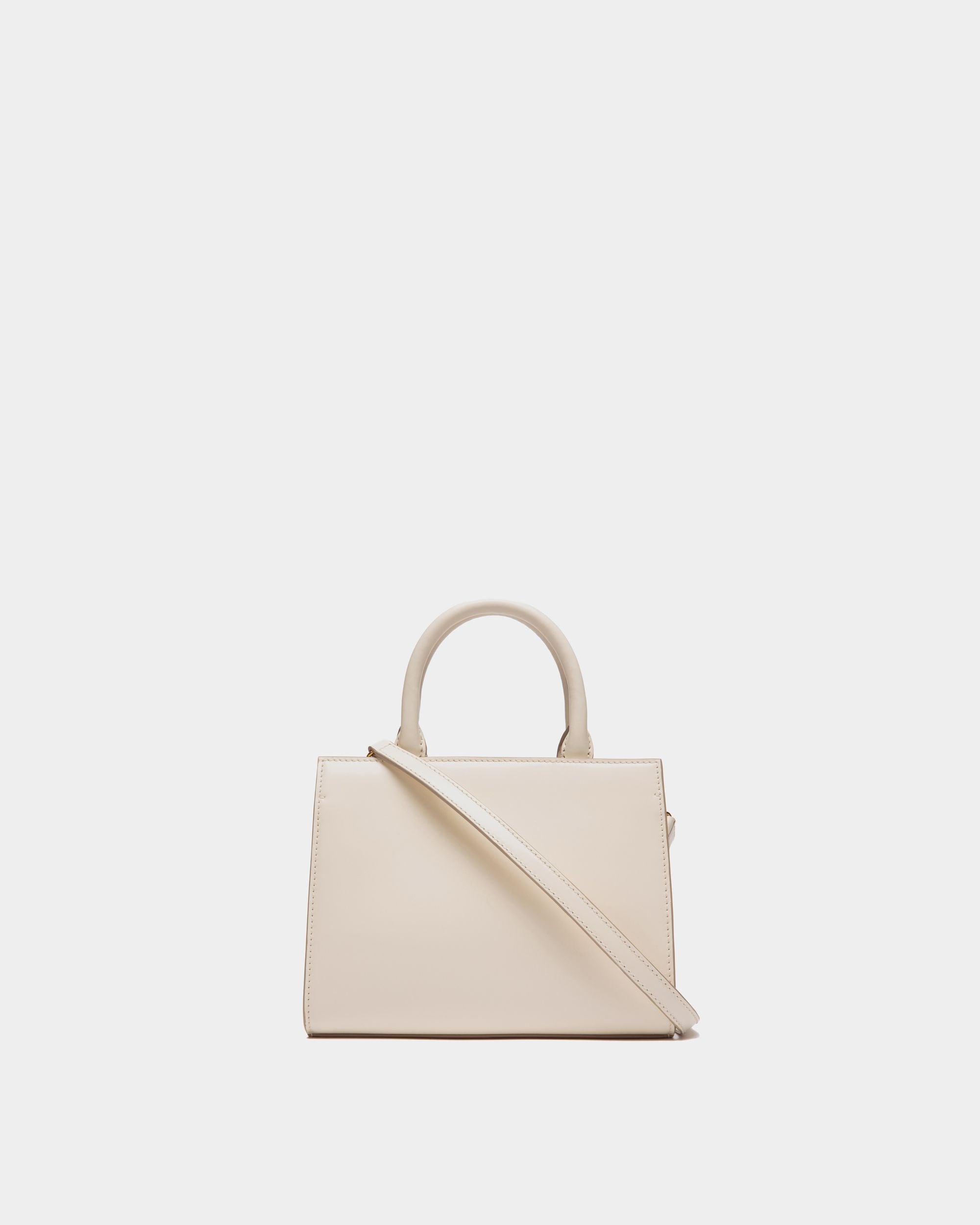 Emblem | Women's Small Tote Bag in White Brushed Leather | Bally | Still Life Back