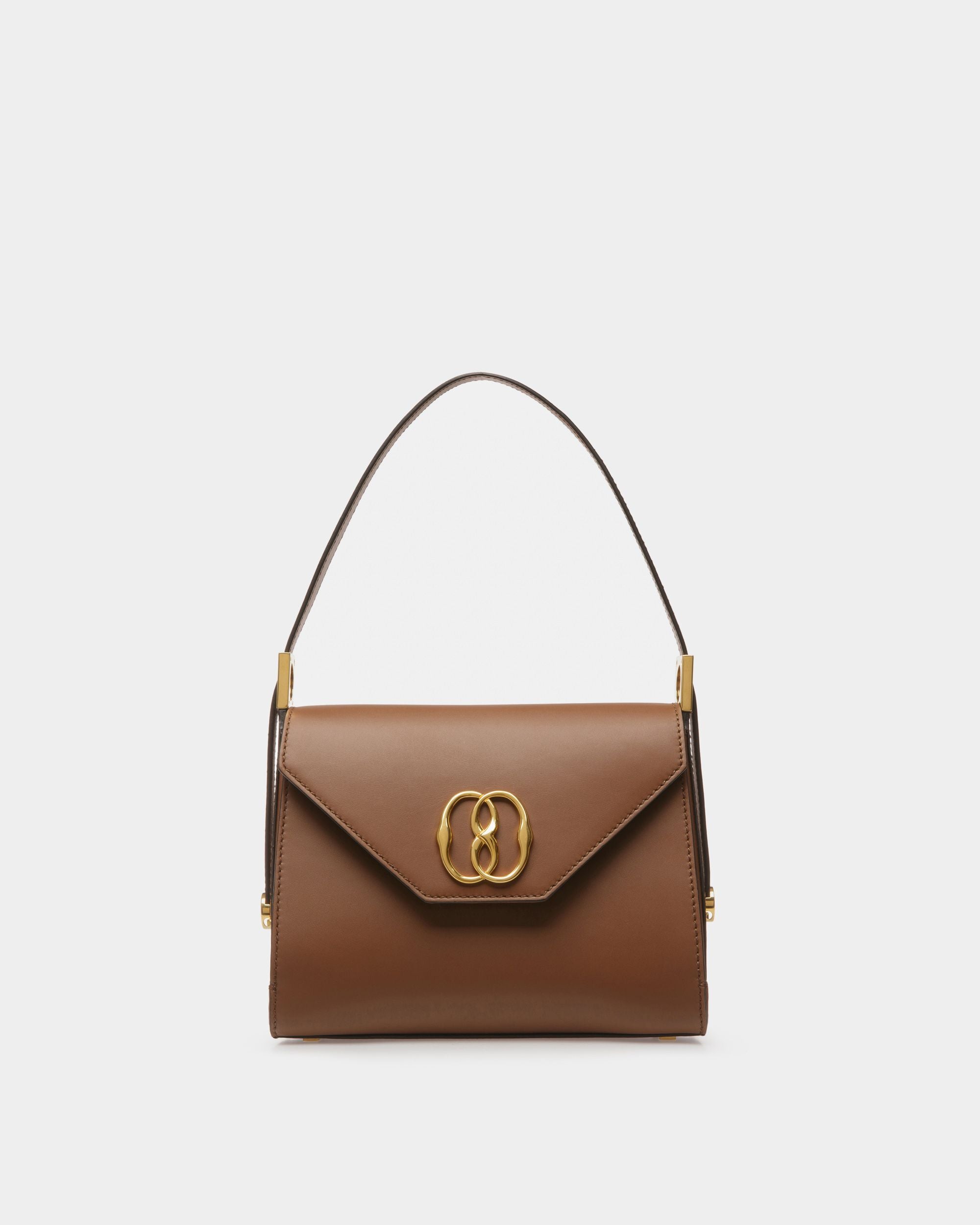 Emblem Trapeze | Women's Top Handle Purse | Brown Leather | Bally | Still Life Front