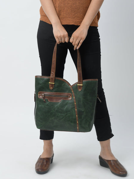 Bottega Veneta® Small Cobble Shoulder Bag in Dark green. Shop online now.