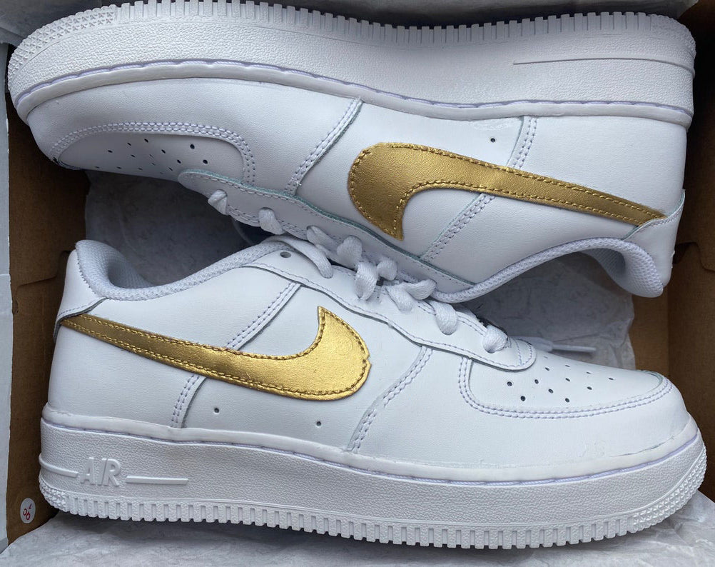 white air force with gold tick