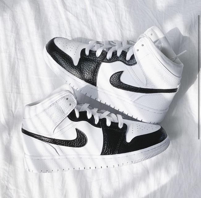 white jordan 1 black swoosh