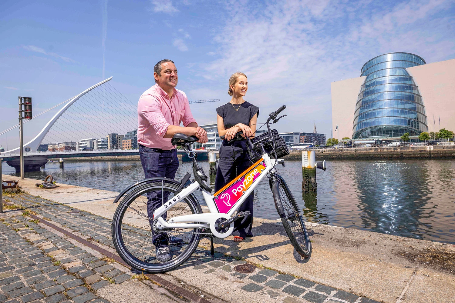 Hugh Cooney, CEO & Founder of Bleeper, and Aoife Ward, Marketing Manager at Payzone Ireland pictured at the launch in Dublin's Docklands. The Bleeper bikes have been branded with Payzone's logo on adboards on either side of the bikes. Bleeper is a public bike sharing service which operates across Dublin city.
