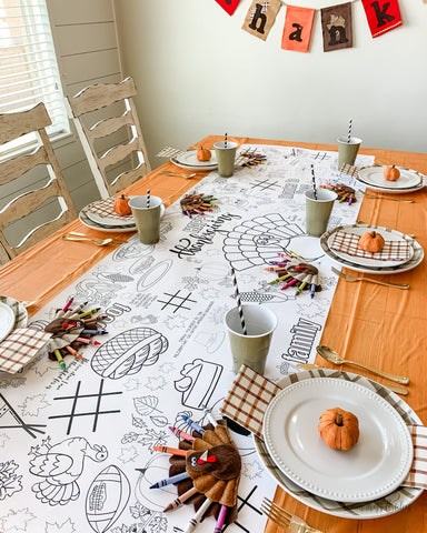 Thanksgiving tablescape featuring a coloring table runner for the kids.