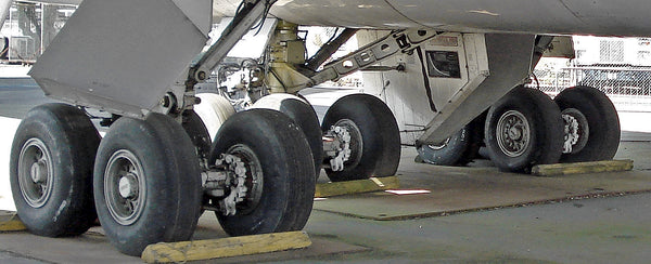 49" tires (18) at 310psi for the 400 ton 747. Successful HP pneumatics, just not cycling.