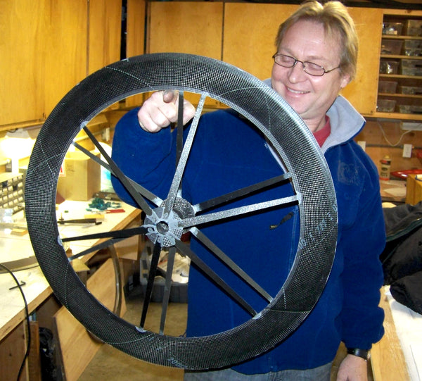 Co-founder (and engineer extraordinaire) Max, with wheel #1 (2009).