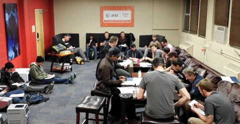 Attend classes, study the book, take the test. Students hard at work. Image © Calvin Jones.