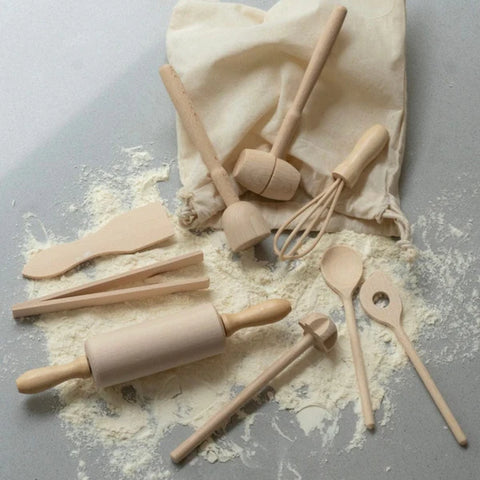 wooden baking set onto of flour