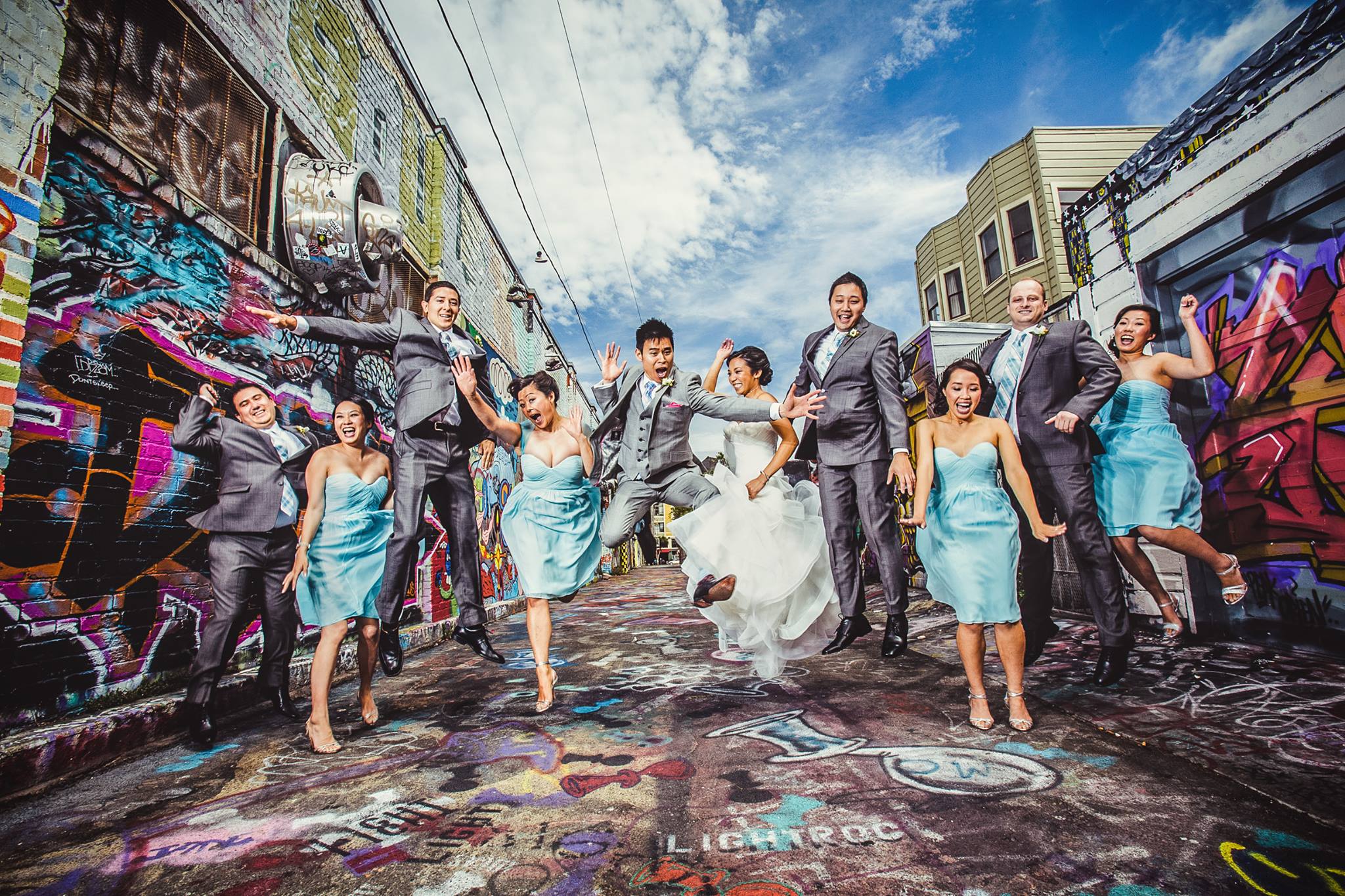 A jump shot of a wedding party