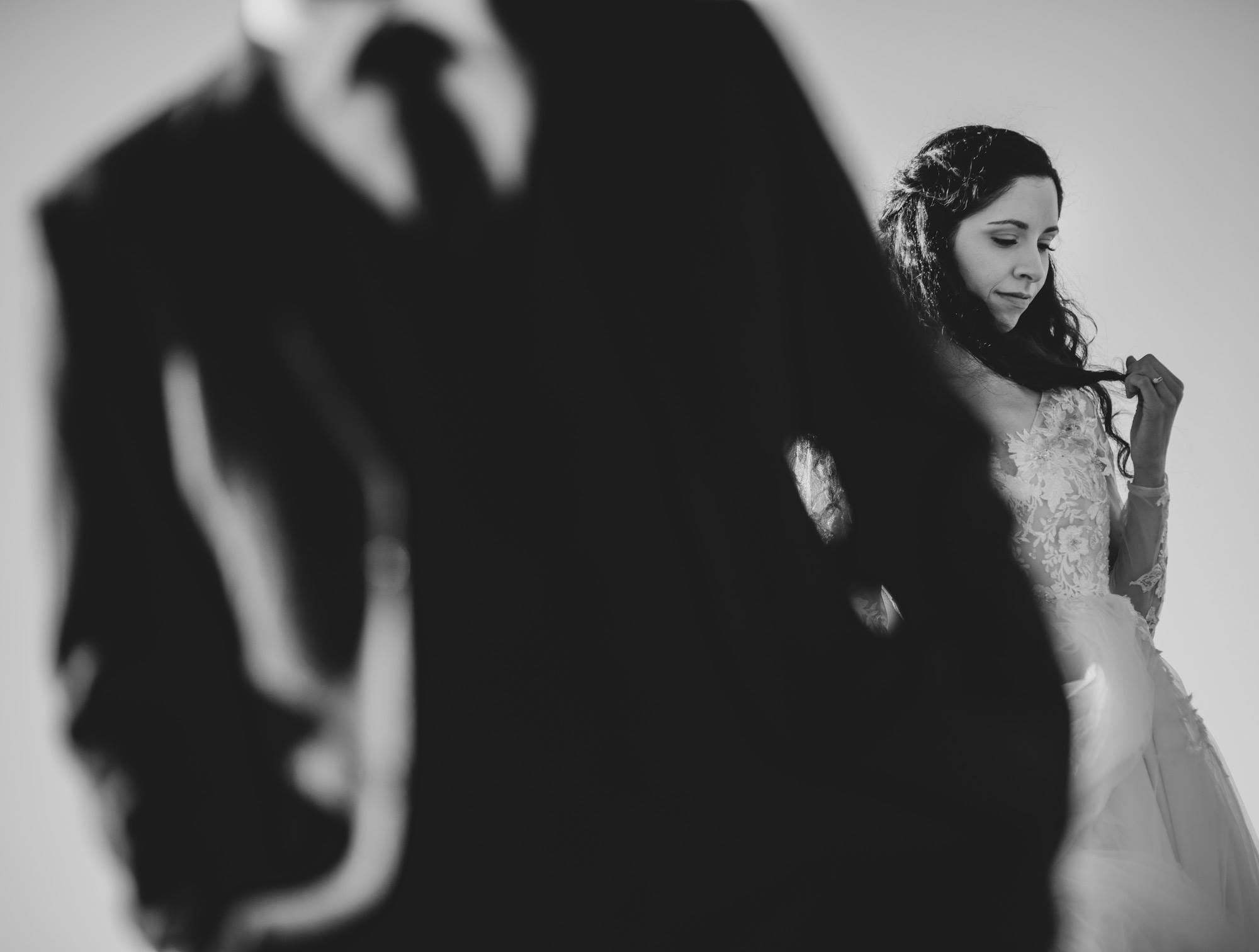 A black and white close up portrait of a bride and groom 