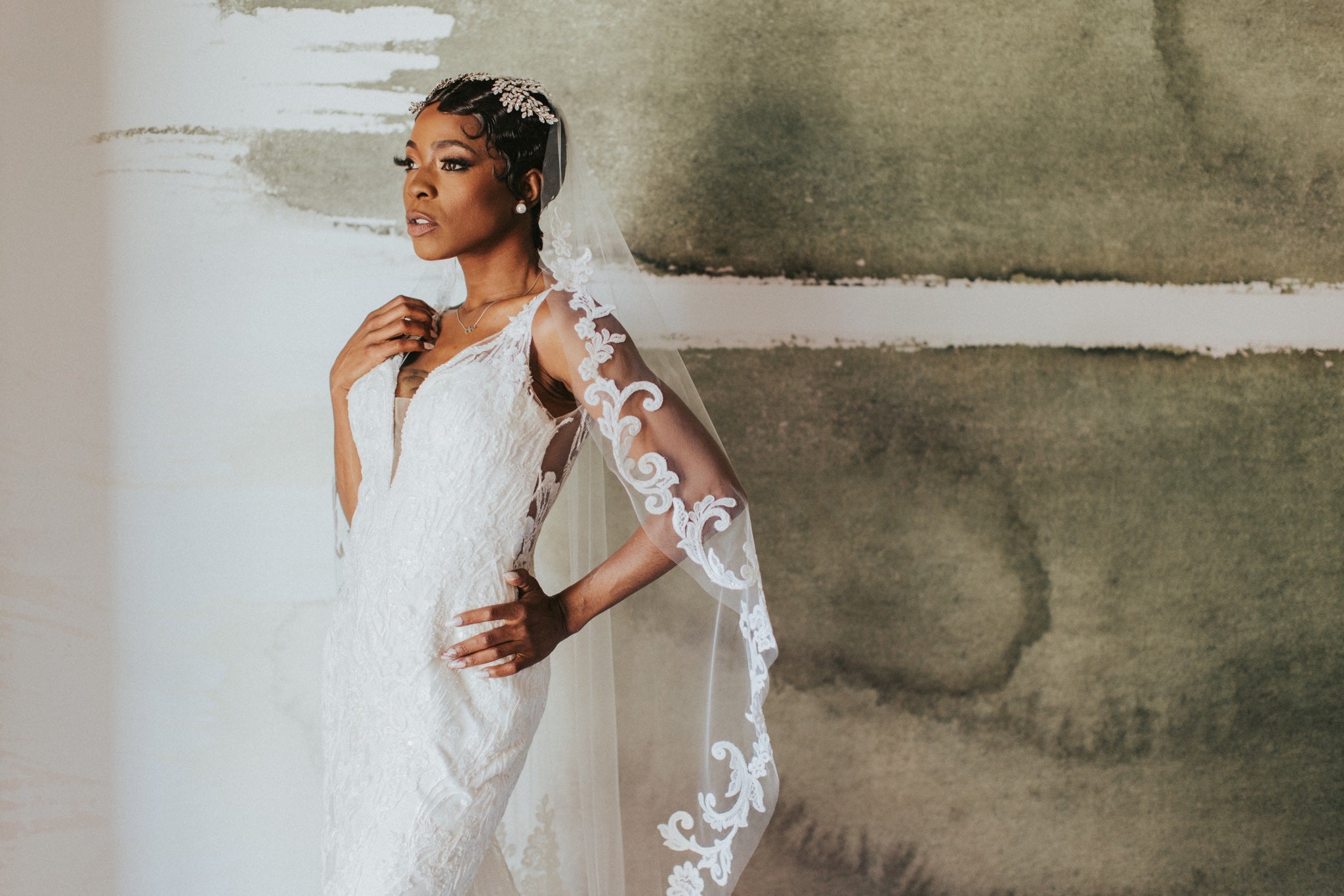 a bride posing in her wedding dress