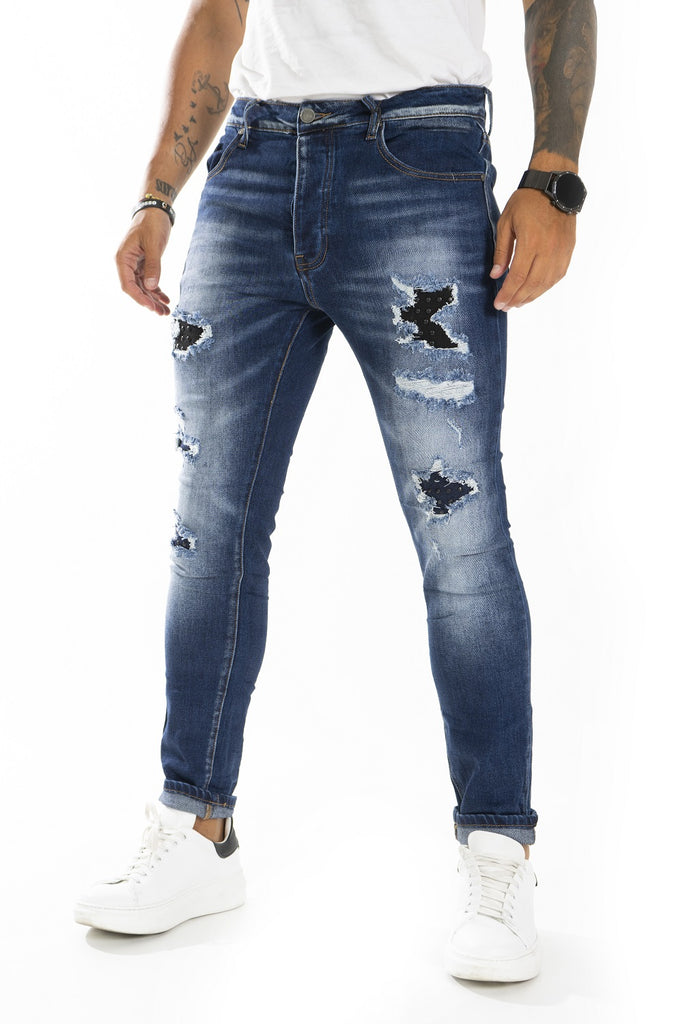 Pantalone jeans cinque tasche con toppe a contrasto