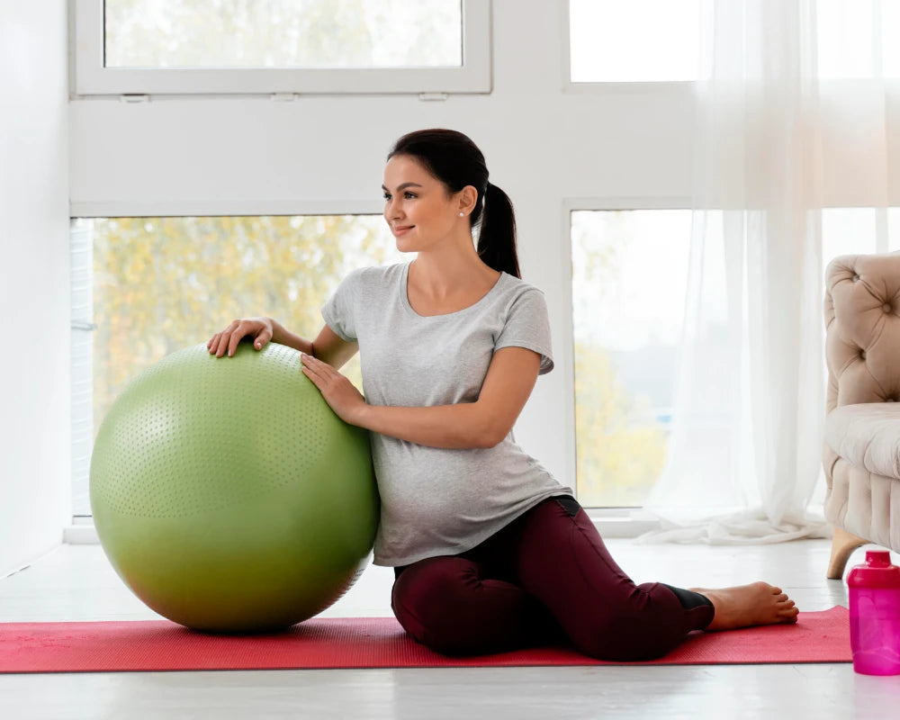 pregnant-woman-exercising-with-green-fitness-ball.webp__PID:c70e2011-63b9-4e06-add6-b23c6b87d03d