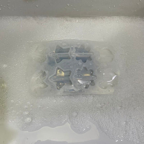 use soapy water to clean silicone molds