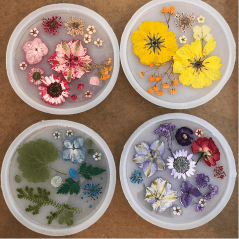 I dry and preserve flowers in resin for jewelry makingthese are my  overflow pieces I've yet to get to. The garden just keeps on giving. :  r/crafts