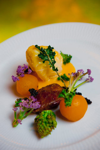 colorful fine dining food on a plate