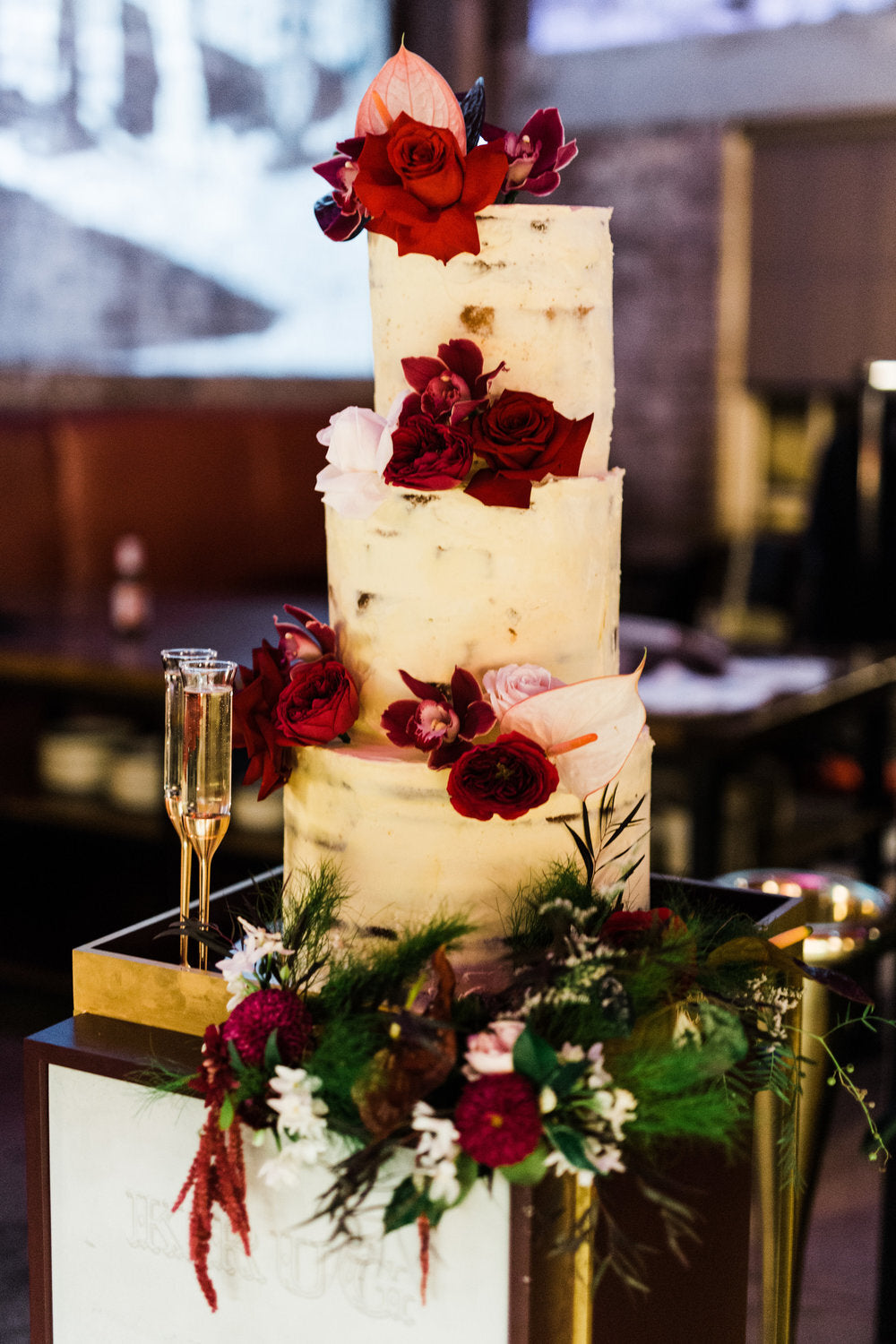 three tier wedding cake with roses flowers bar m sydney