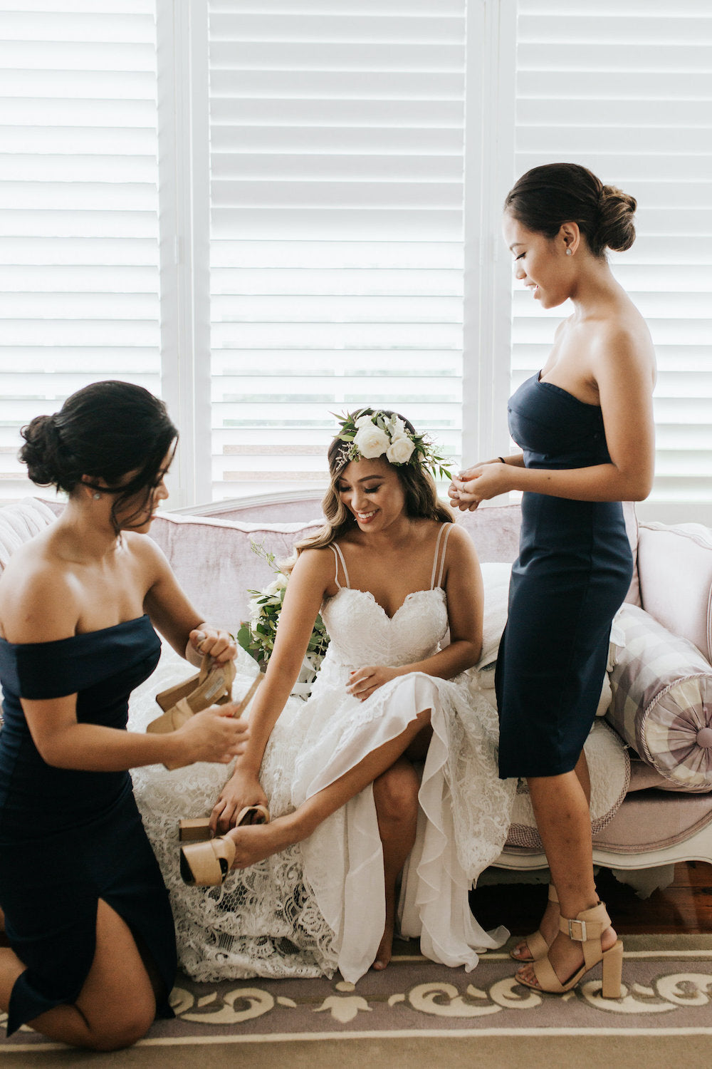 bride getting ready flower crown navy dresses