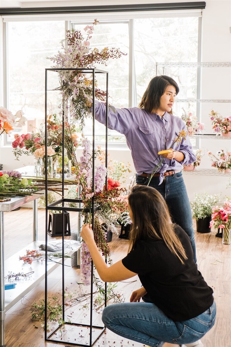 demonstration of backdrop installation design sydney floristry course
