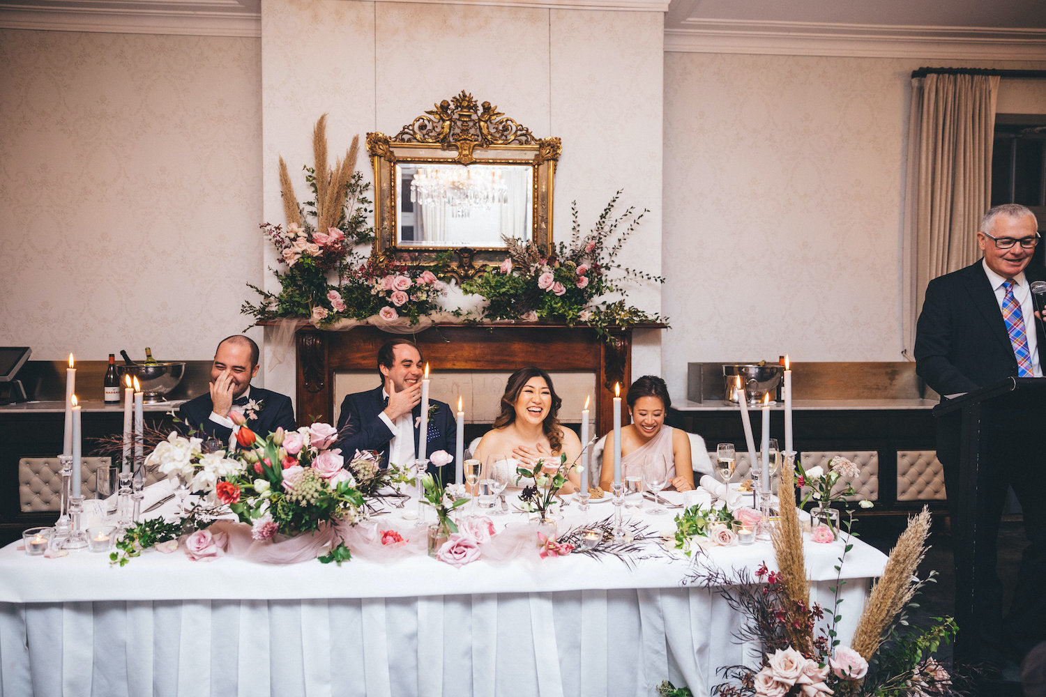 wedding bridal table with flowers at reception gunners barracks