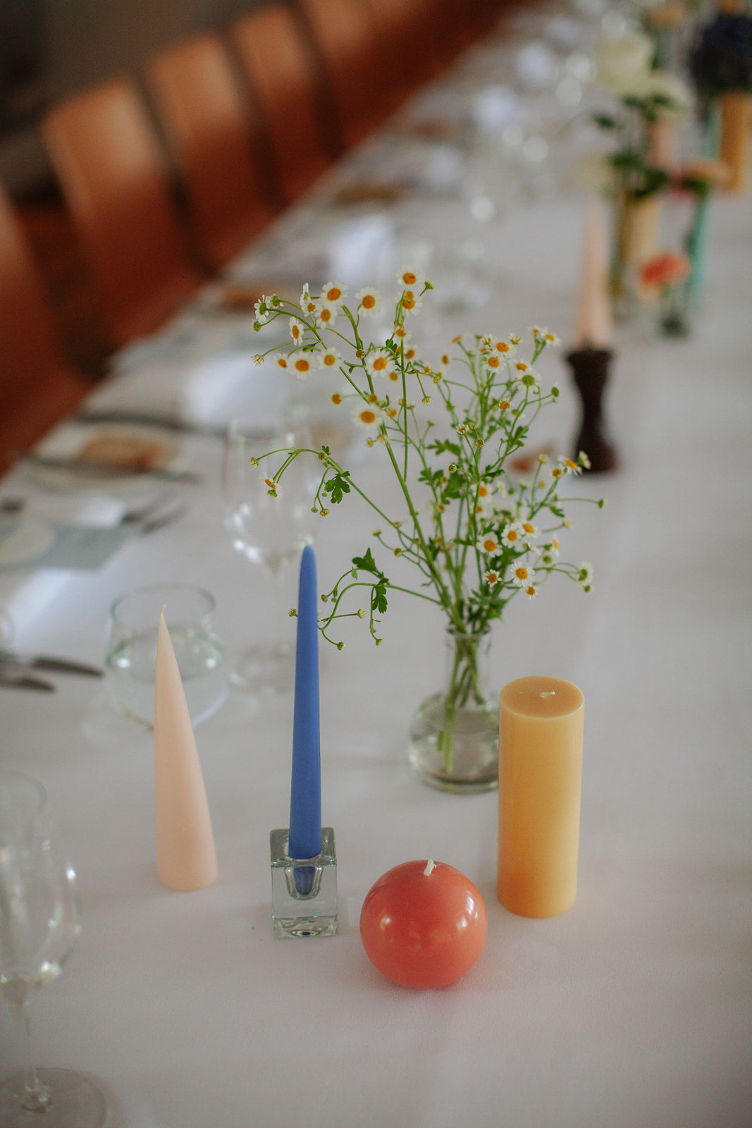 dainty colourful wedding reception candles flowers