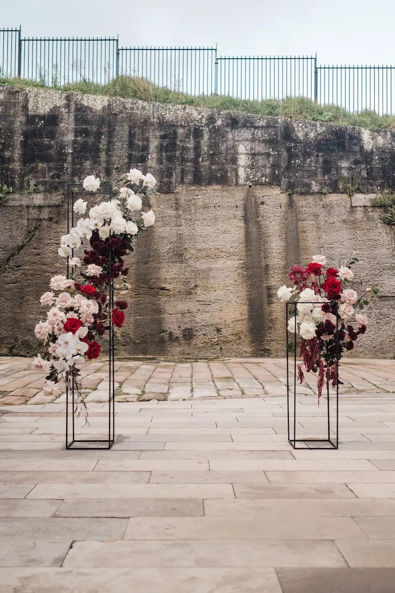 floral ceremony backdrop modern arch stands gunners barracks wedding