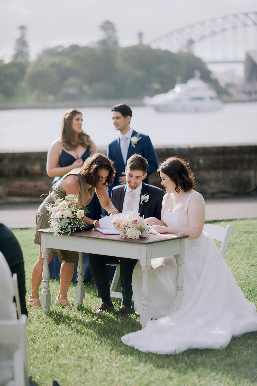 wedding signing with celebrant sydney harbour view lawn