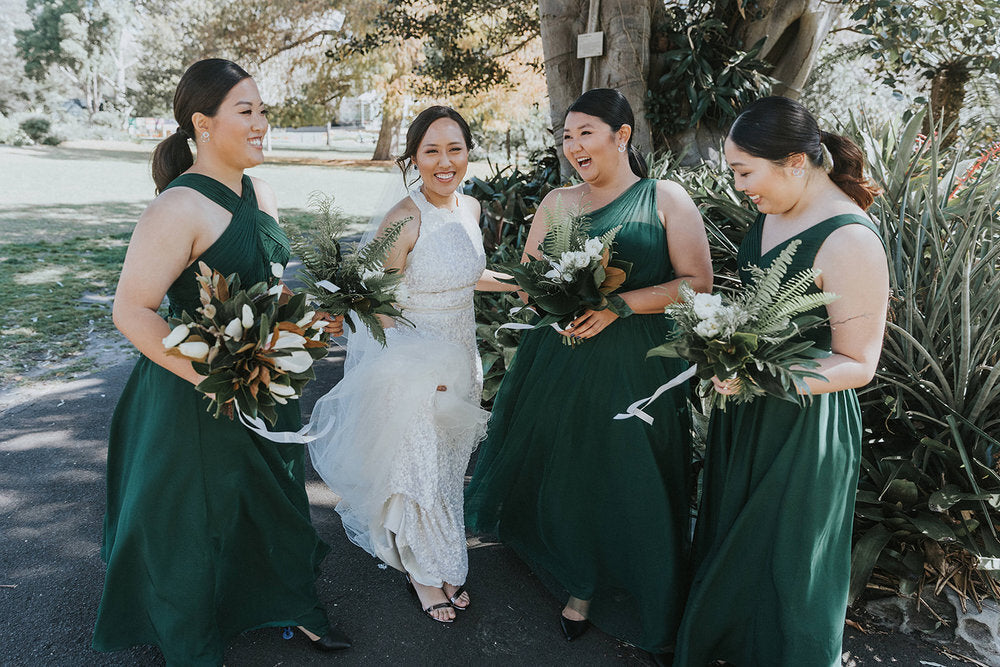 bride with bridesmaids green dresses 
