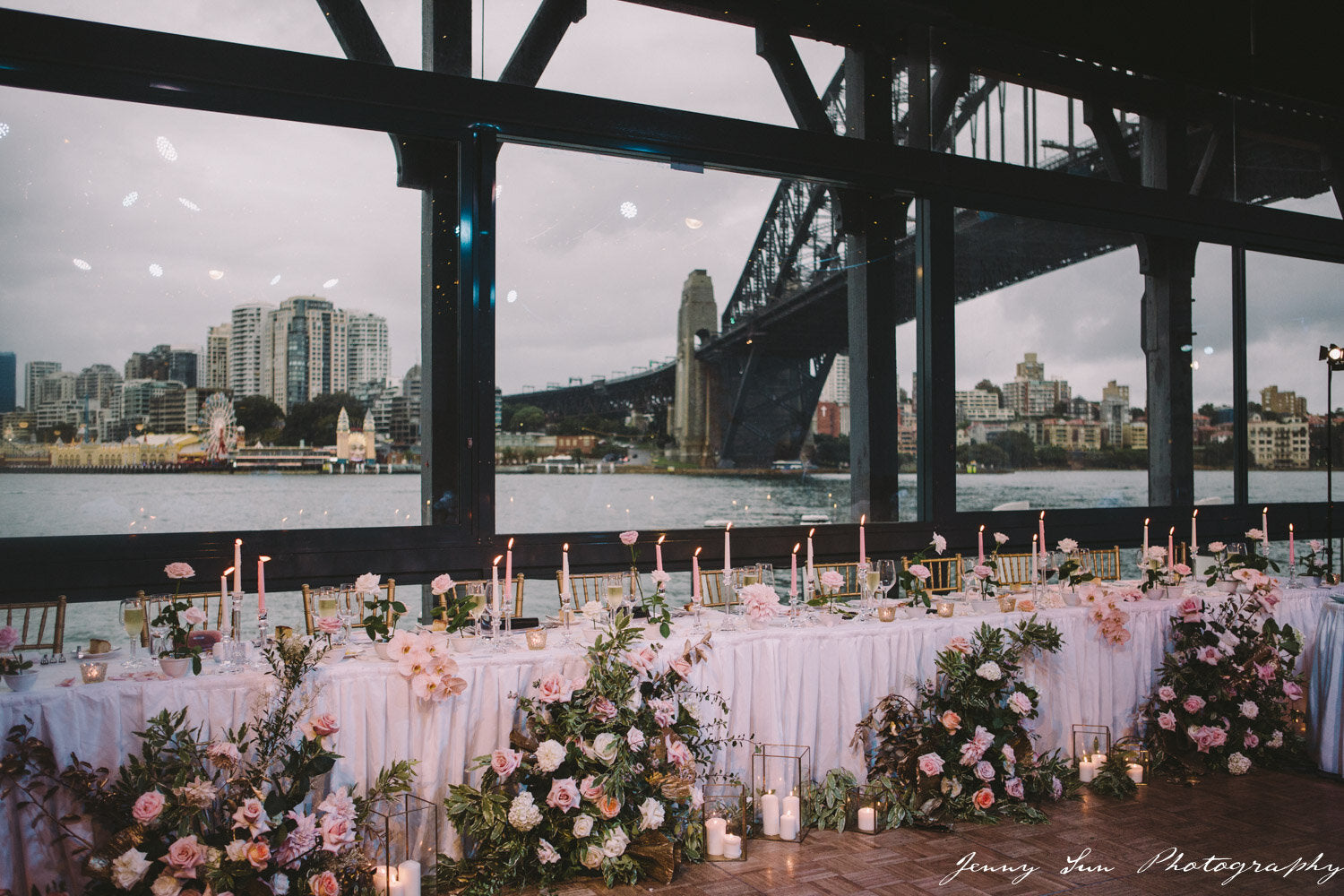 sydney wedding reception pier one water room bridal table with flowers candles