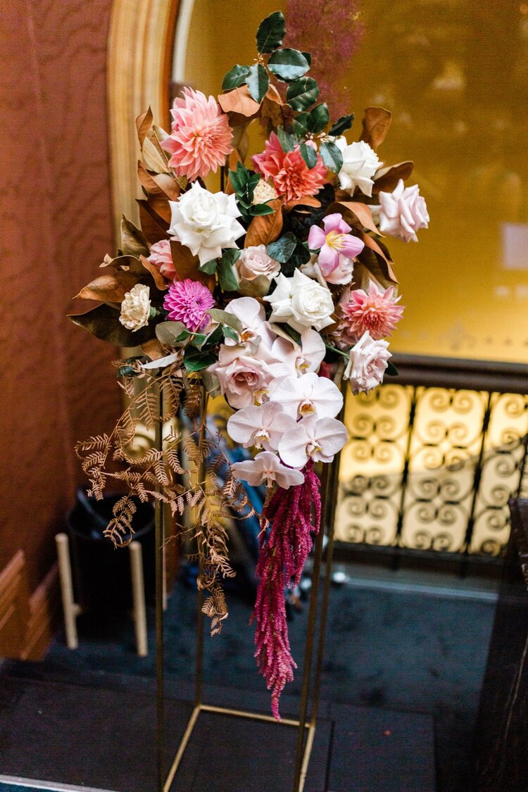 entrance flowers to qvb tea room wedding