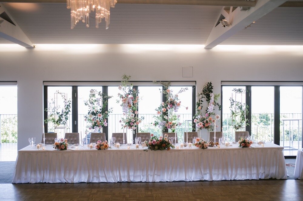 wedding reception bridal table flowers backdrop installation sergeants mess