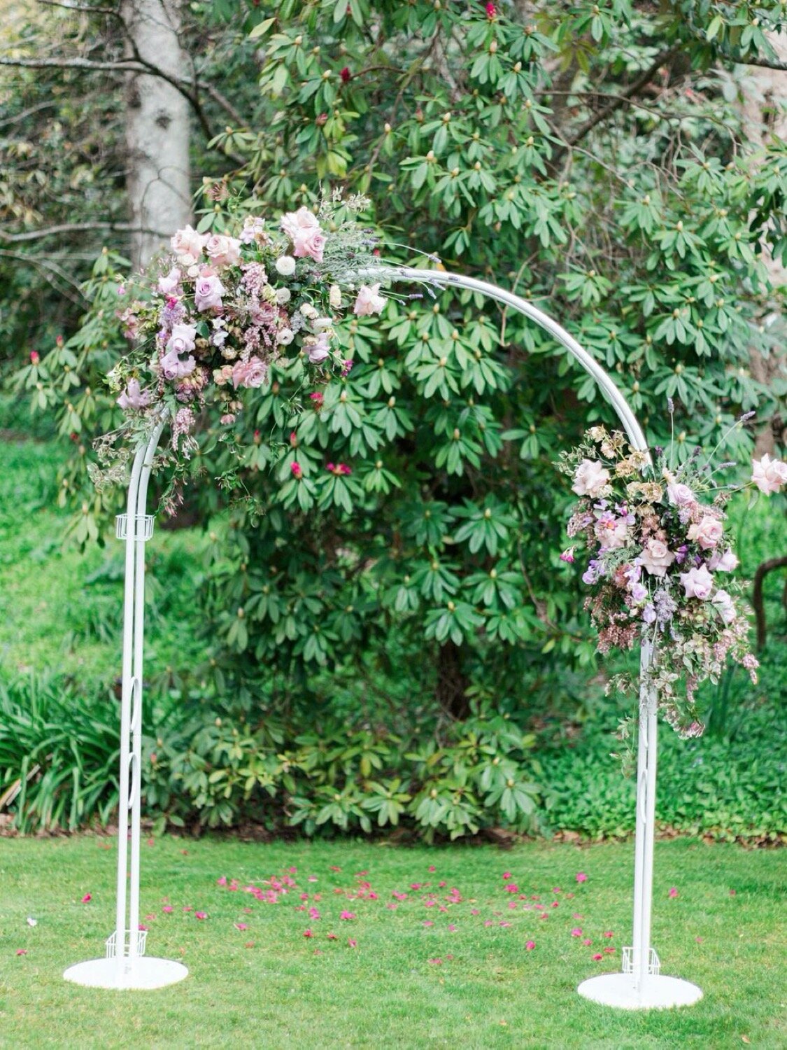 wedding ceremony arch at bowral milton park garden with flowers
