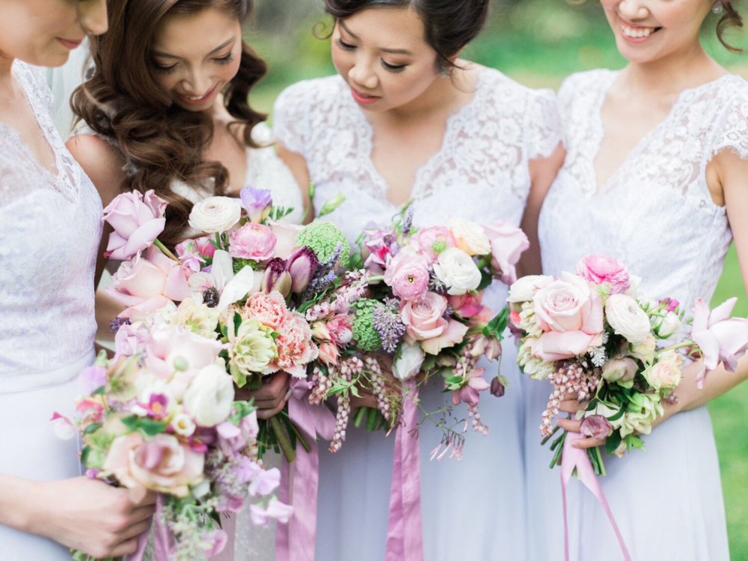 bride with bridesmaids spring garden whimsical bouquets at milton park