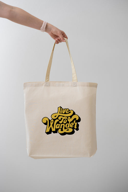 LIVE TO WANDER TOTE BAG