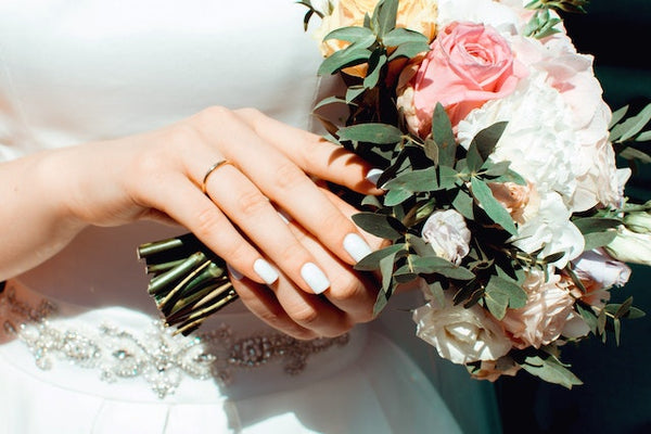 Wedding ring and bouquet