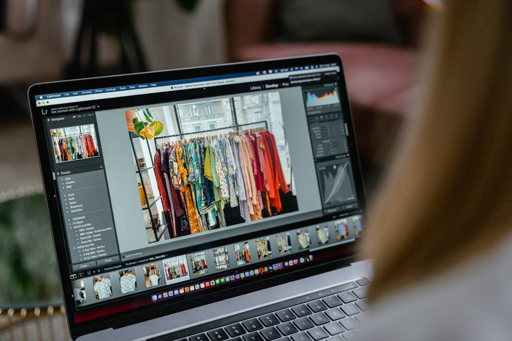 A Person Editing Pictures on a Laptop