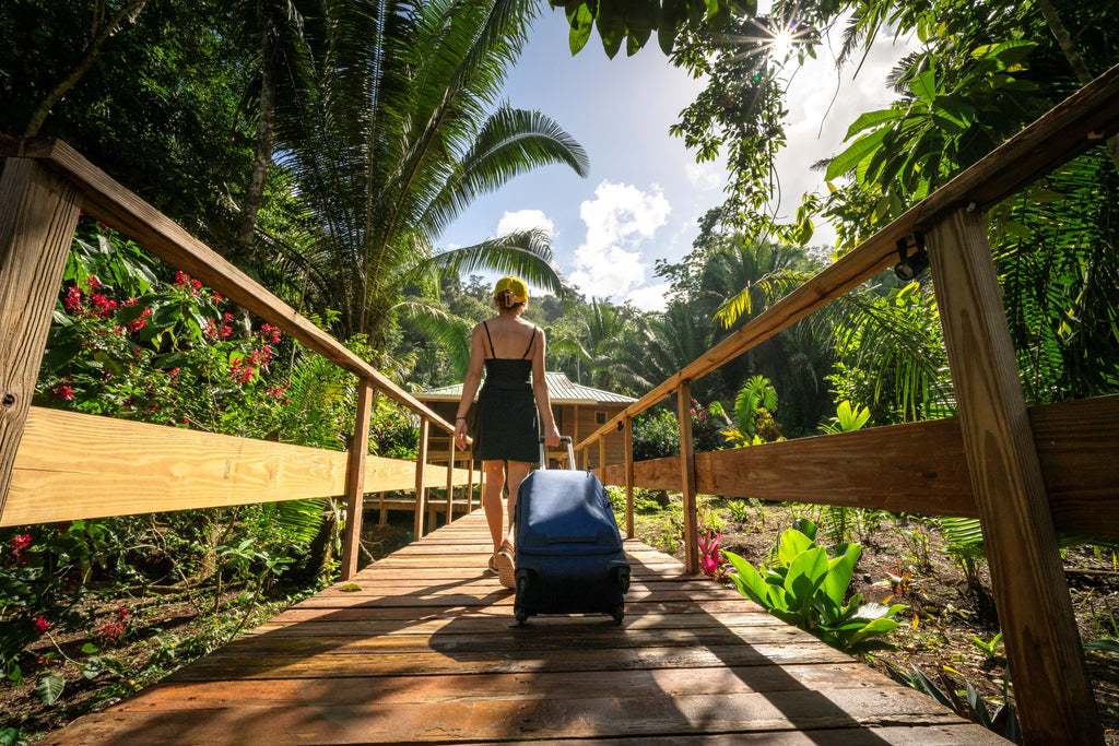 Wheeling a Carry-On Bag on a Boardwalk in Belize