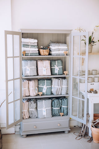 Linen bedding and homewares at Peony Blue Florist in Bournemouth 