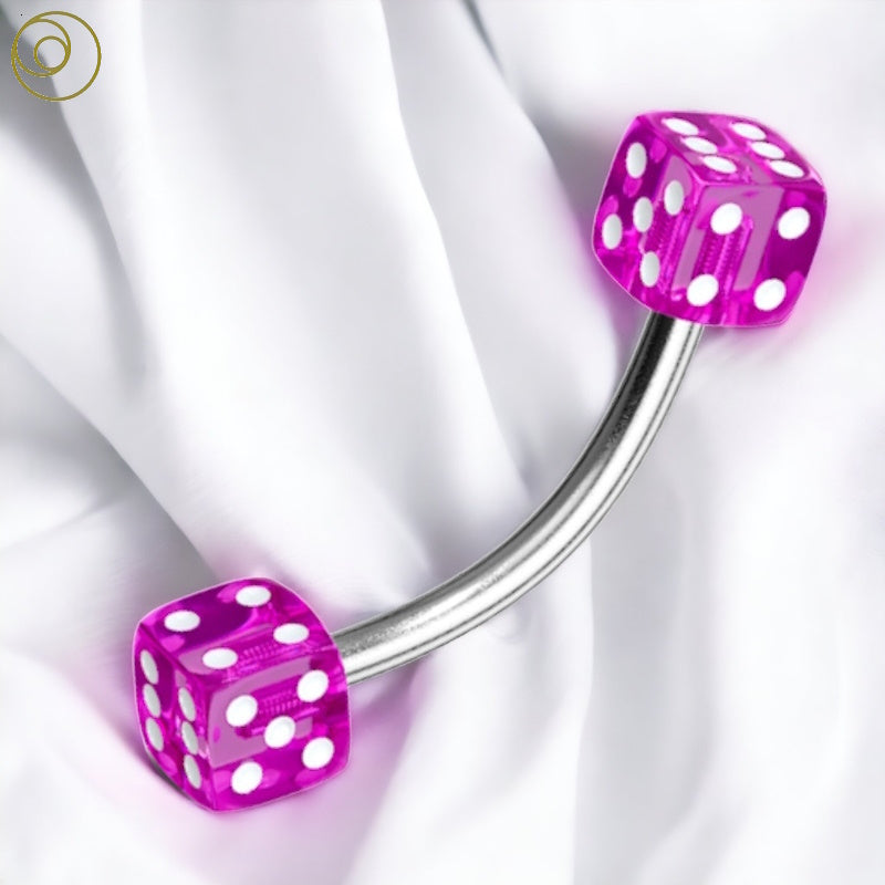 A purple dice rook piercing curved barbell pictured against a white fabric background.
