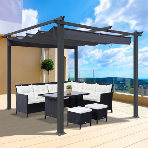black pergola with a sectional under it