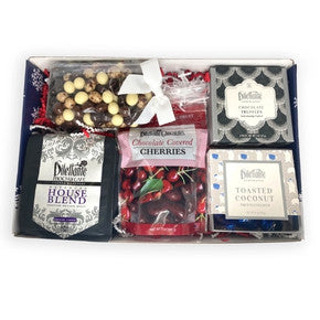 Dilettante Chocolates Opened Snowflake Gift Collection inside a bright blue box