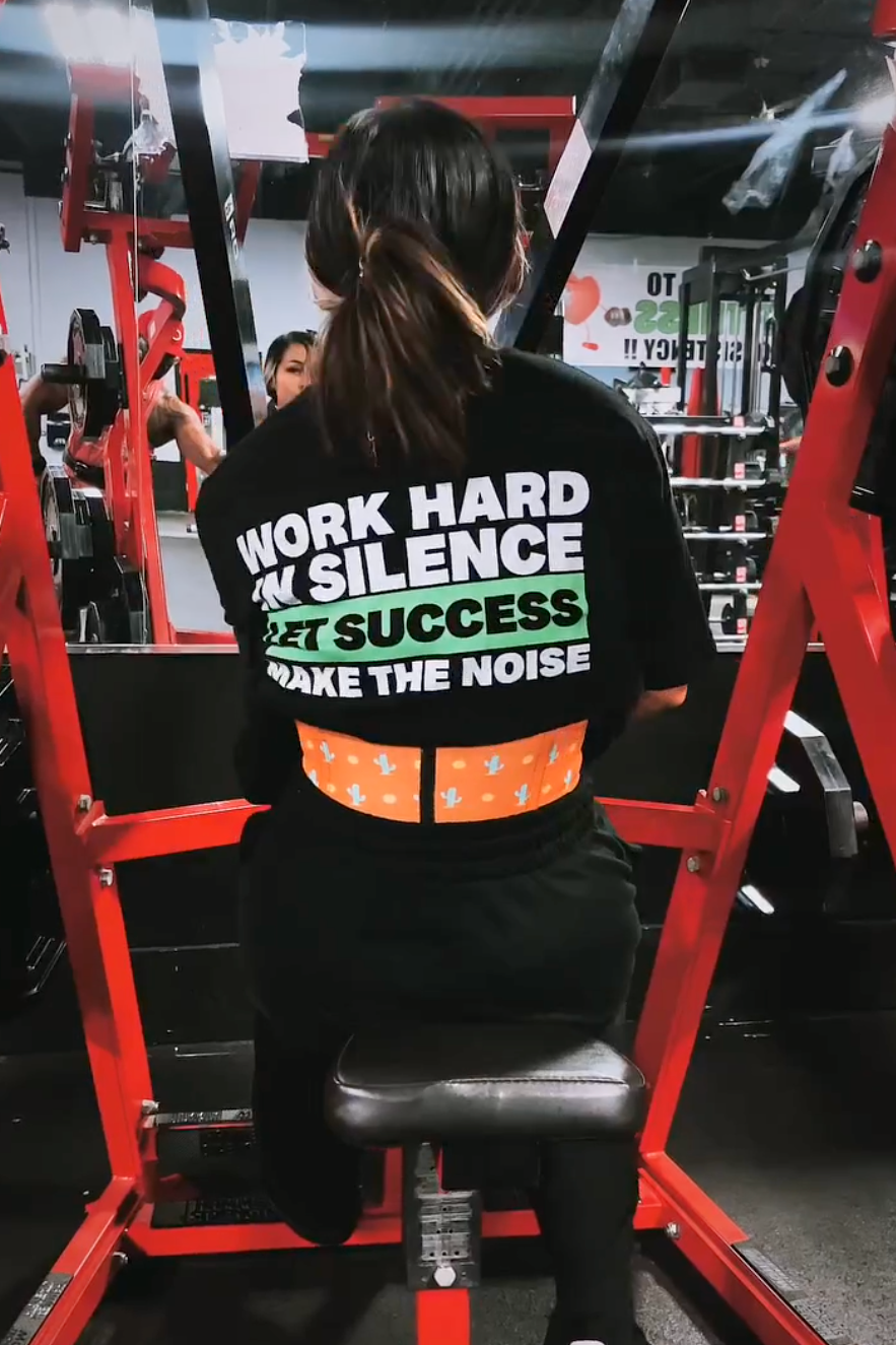 girl in OBSC tee working out