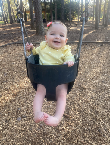 cute baby in swing
