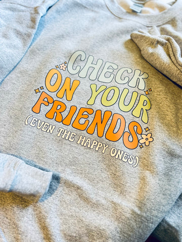 Check on your friends - a mental health awareness graphic tee