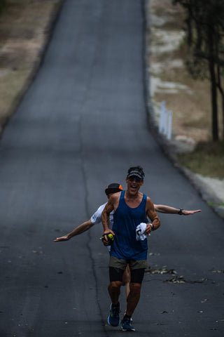 Justin “running rings” around ultra marathon legend Dean Karnazes!