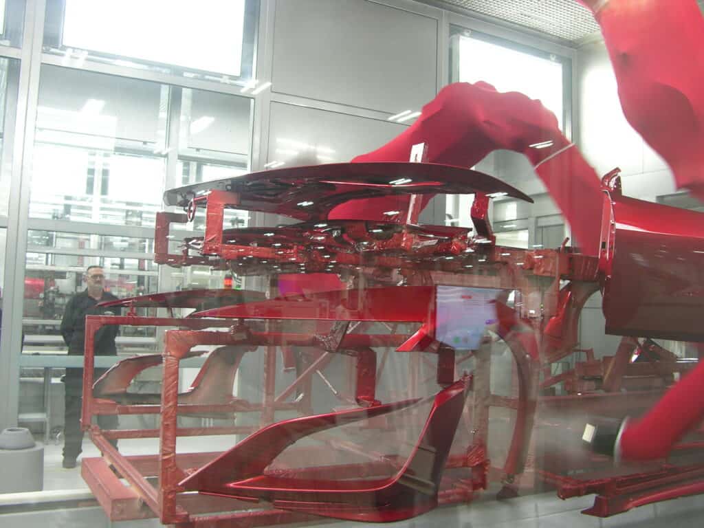 A series of Acura NSX body panels go through the automated paint booth at the Honda PMC Headquarters in Ohio. Photo Credit: Micah Wright