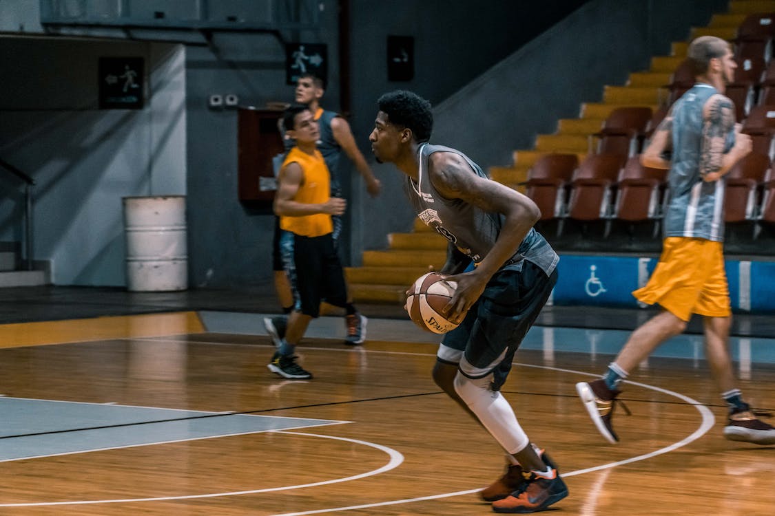 basketball player holding a ball