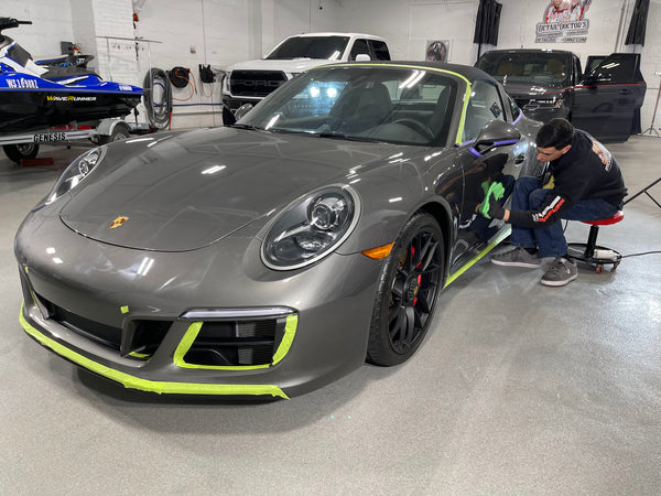 Porsche car getting a paint correction by detail doctors in Milwaukee, Wisconsin